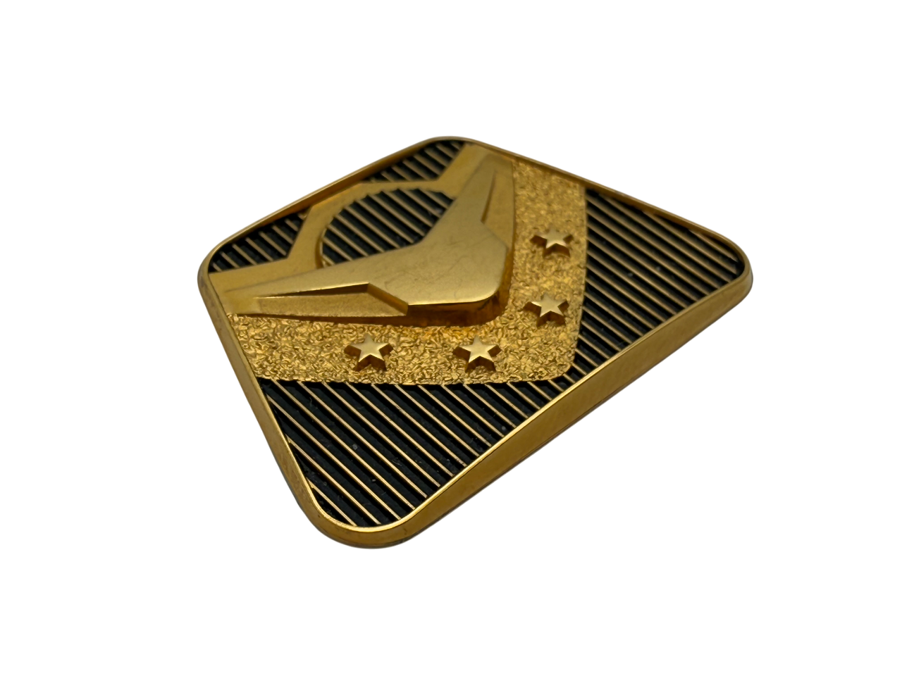 Electroformed decorative badge with raised design