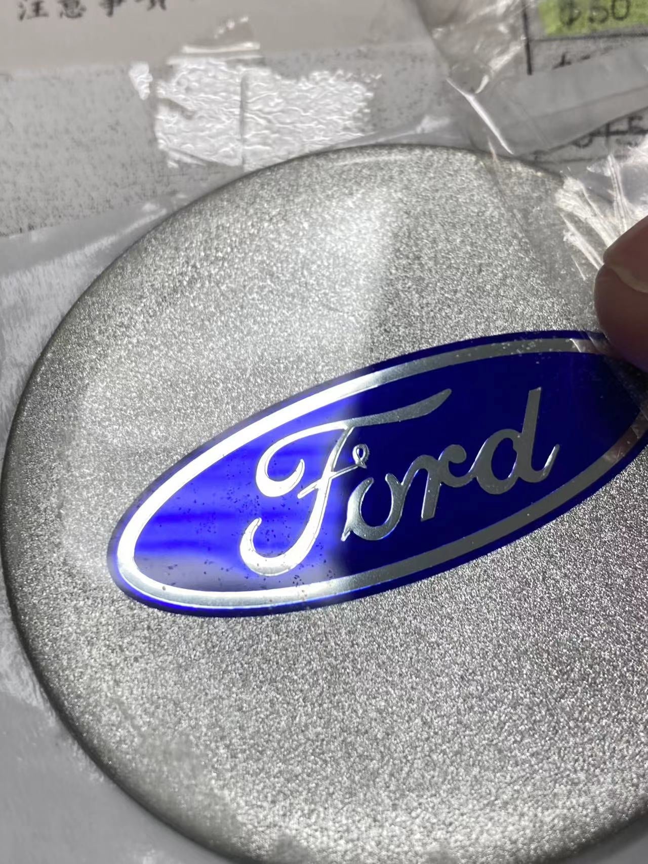Dome badge used as Ford wheel emblems
