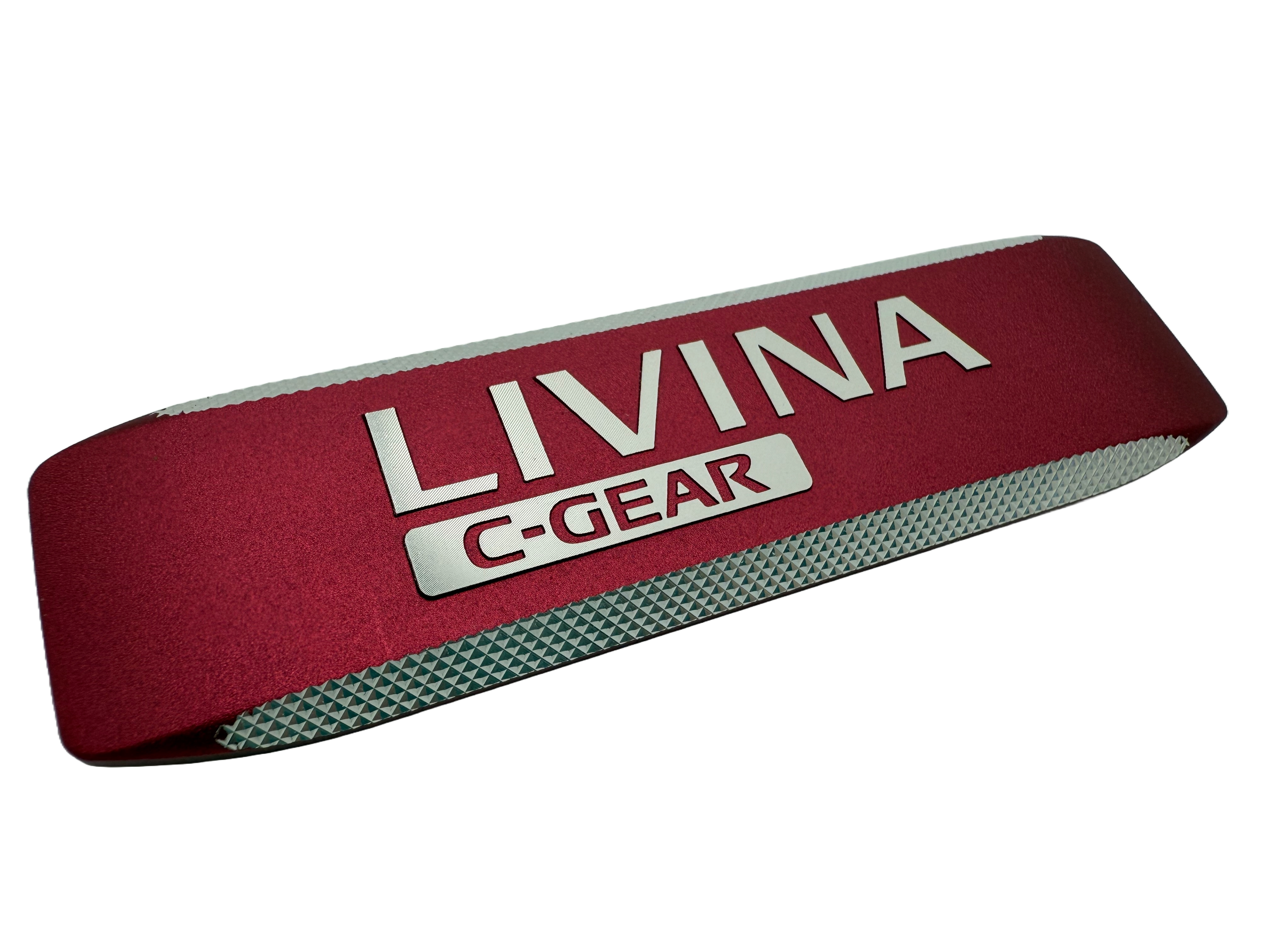 Forged aluminum badge with anodized recessed background and diamond cut lettering which reads"Livina C-Gear".