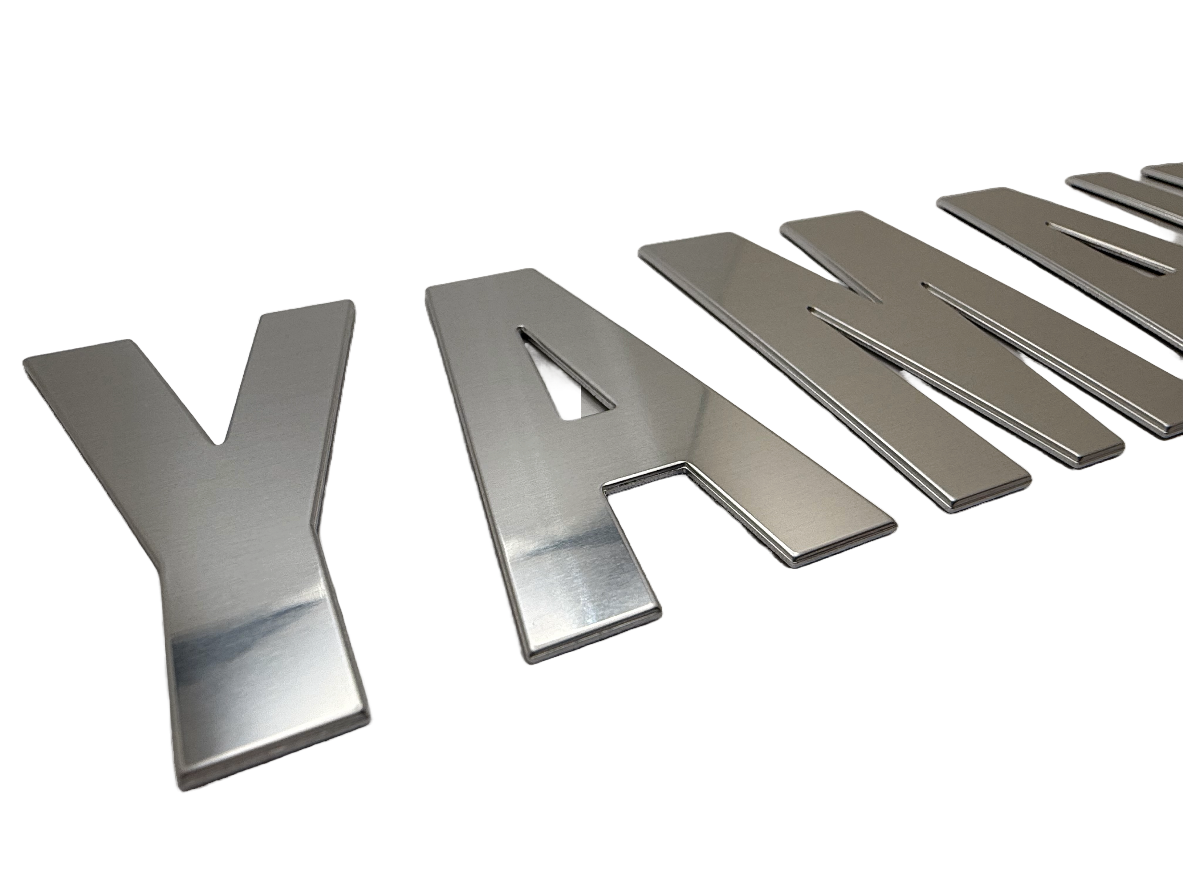 Custom boat lettering for Yamaha. Lettering was produced using mirror aluminum.