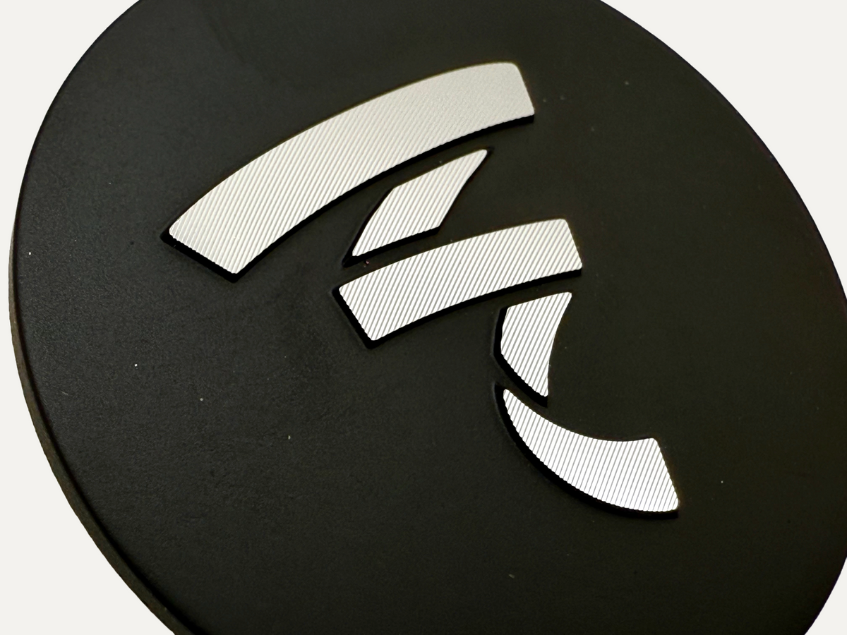 Forged aluminum badges with diamond cut logo. 