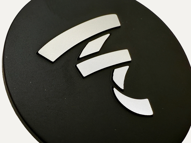 Forged aluminum badges with diamond cut logo. 