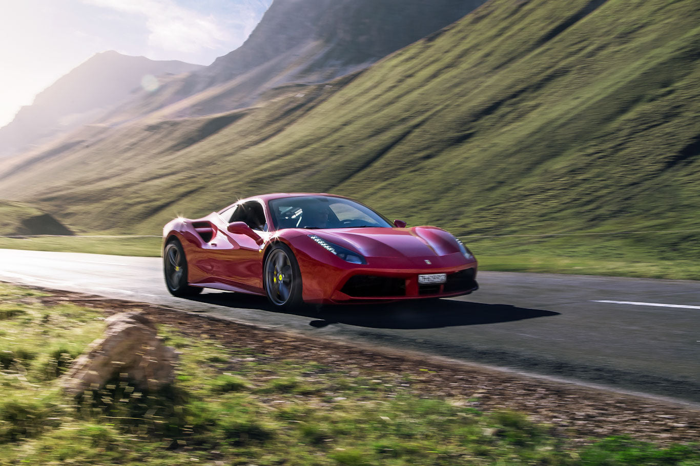 Ferrari proudly displaying its car badge in the sun