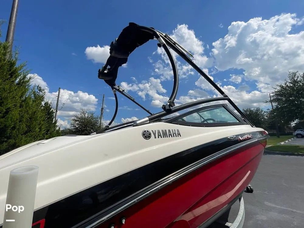 Yamaha boat proudly displaying it badge on the side. 