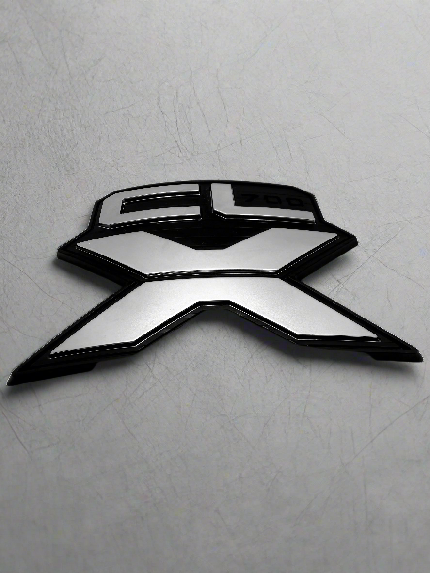 Injection molded ABS plastic CL-X badges. With painted surface. 
