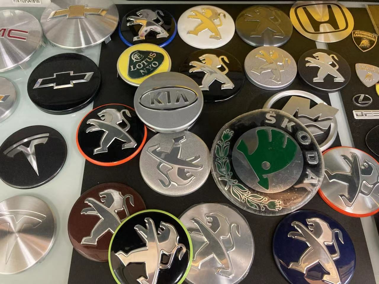 A collection of oem car badges