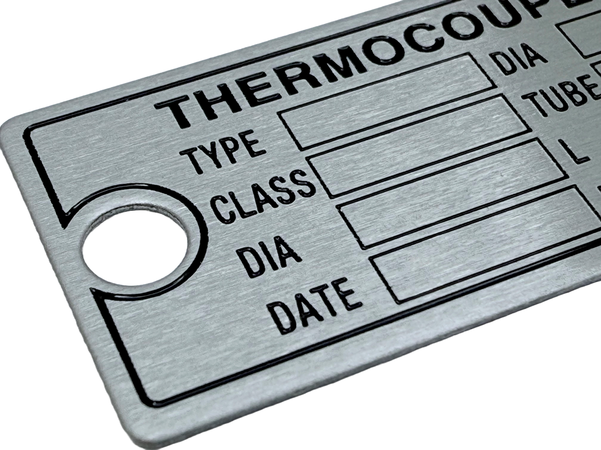 Stainless steel identification tag, etched and paint-filled with 'Thermocouple' heading and Type, Class, Dia, and Date fields