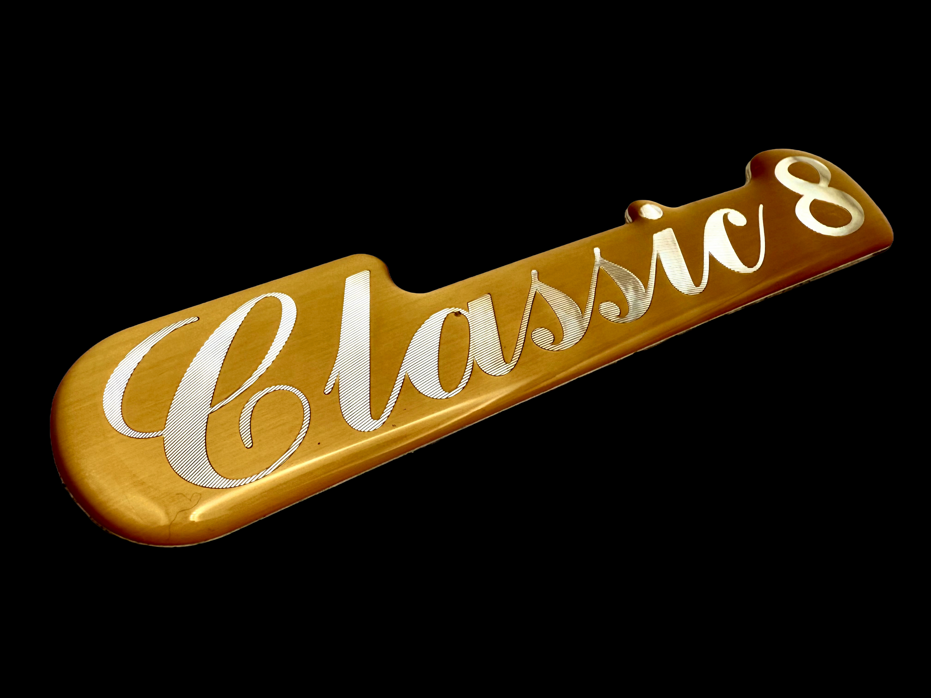 Classic badge produced using embossing and diamond cutting