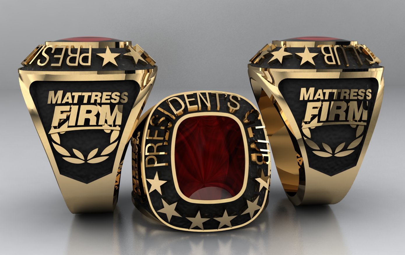 3 custom gold rings made for Mattress Firm