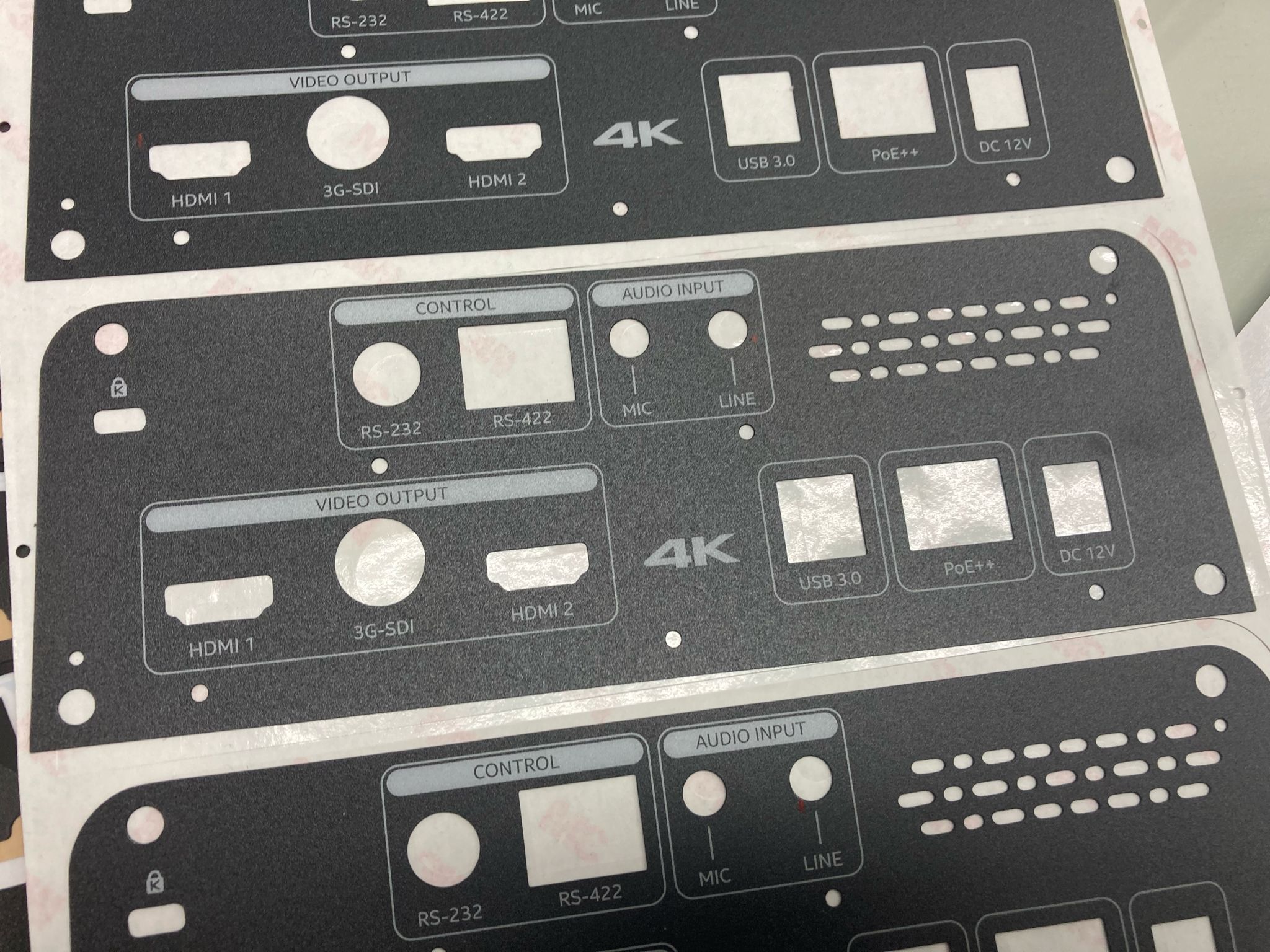Black graphic overlay that goes over a membrane switch