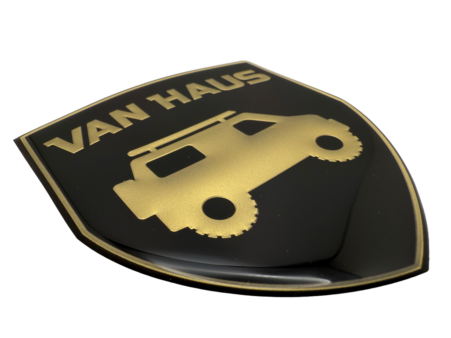Domed badge for the RV industry. Printed and embossed gold logo.
