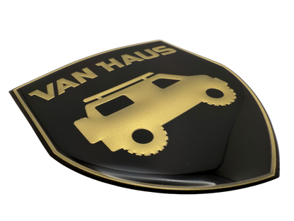 Domed badge for the RV industry. Printed and embossed gold logo.