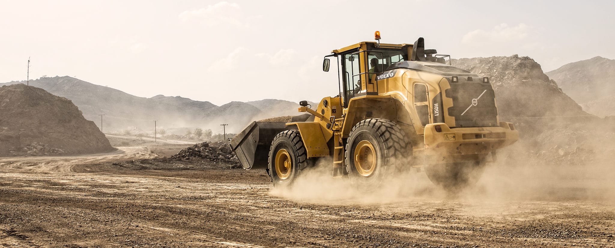 Large piece of construction machinery proudly displaying its badges and nameplates