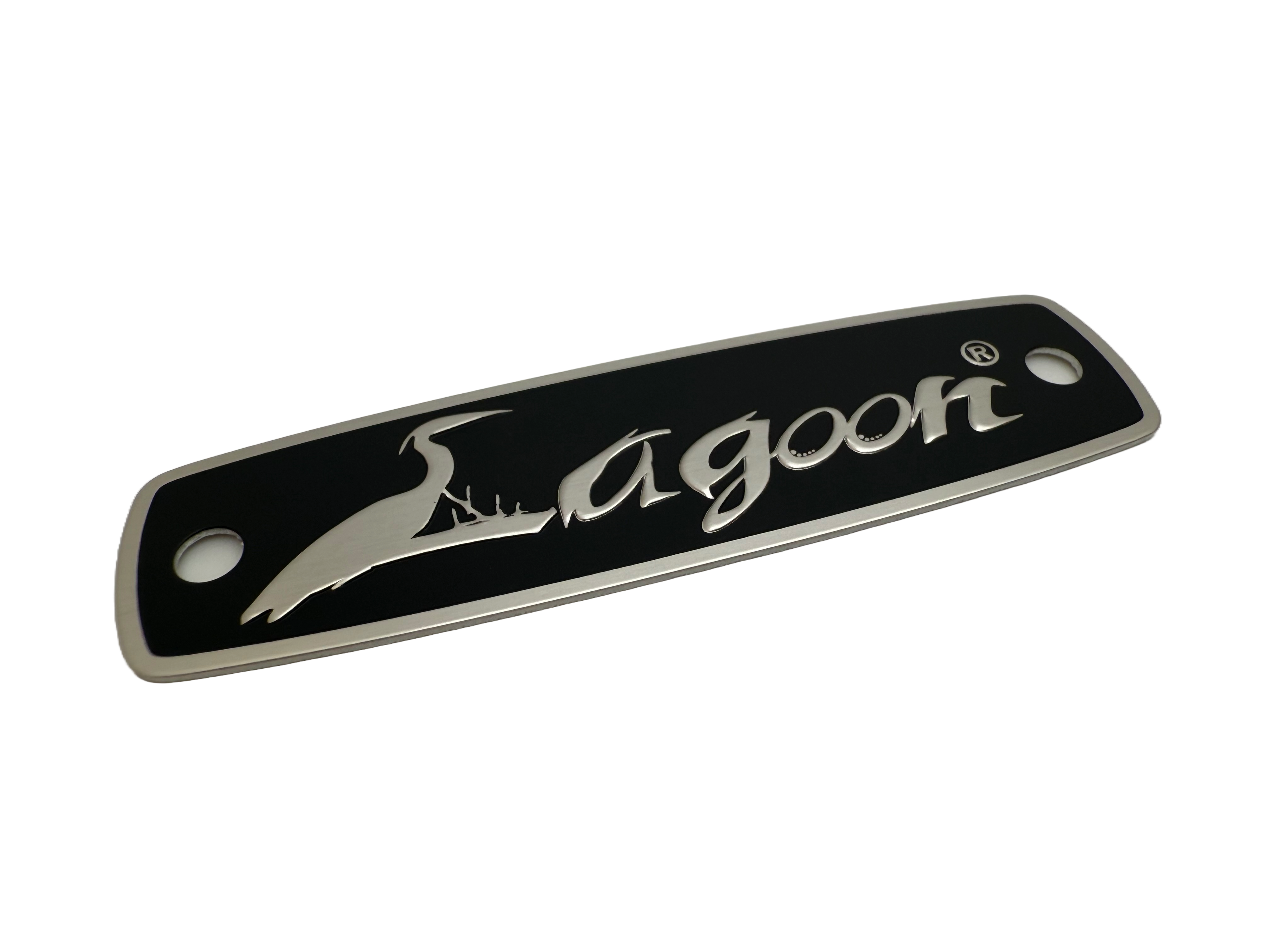 Seating labels fabricated using aluminum, black screen printing and embossing in the metal&