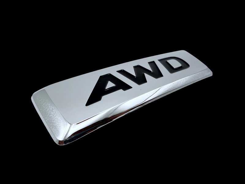 AWB badge produced using ABS injection molding, with chrome plating and painted recessed areas. 