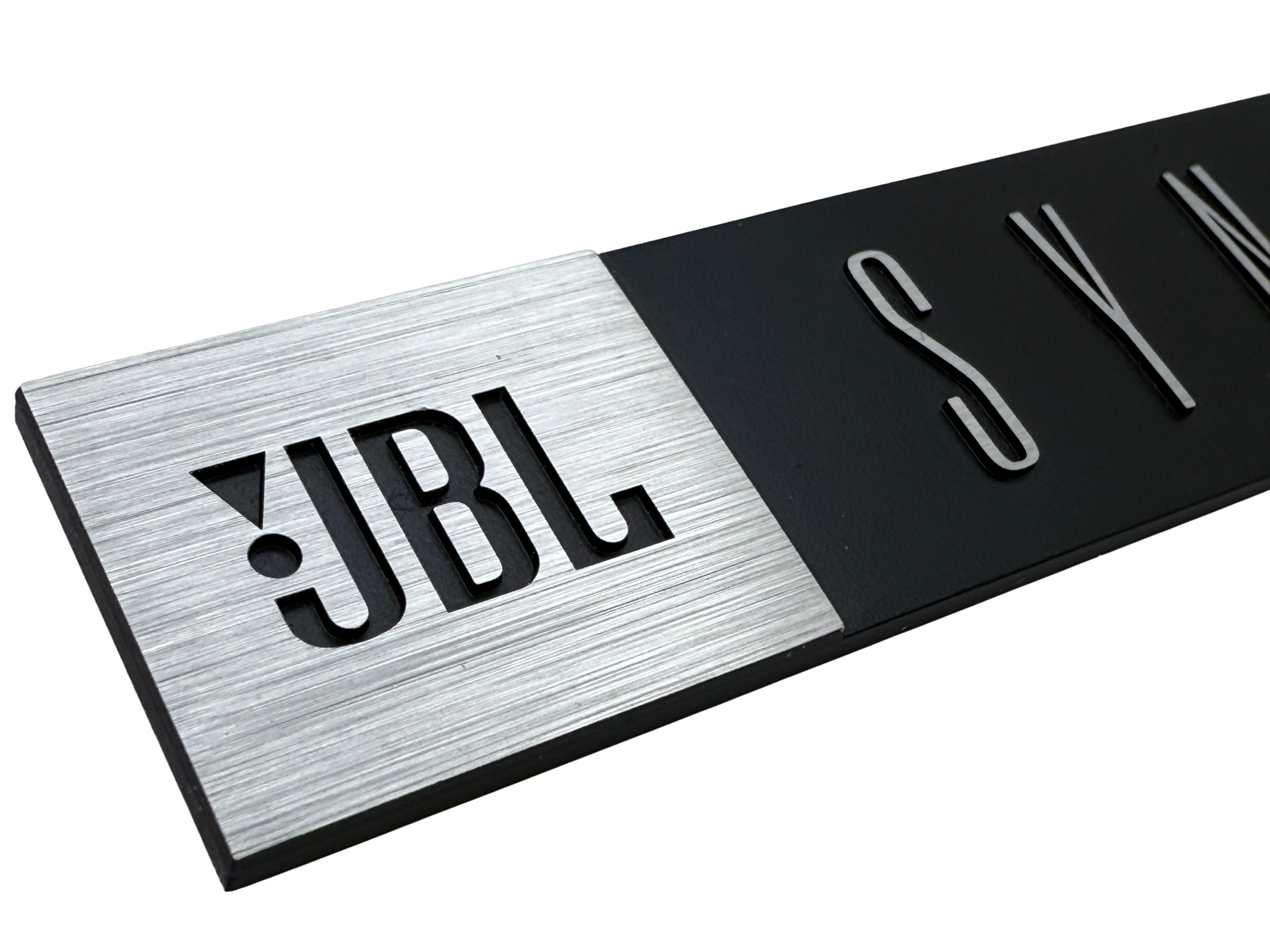 Precision engineered badge