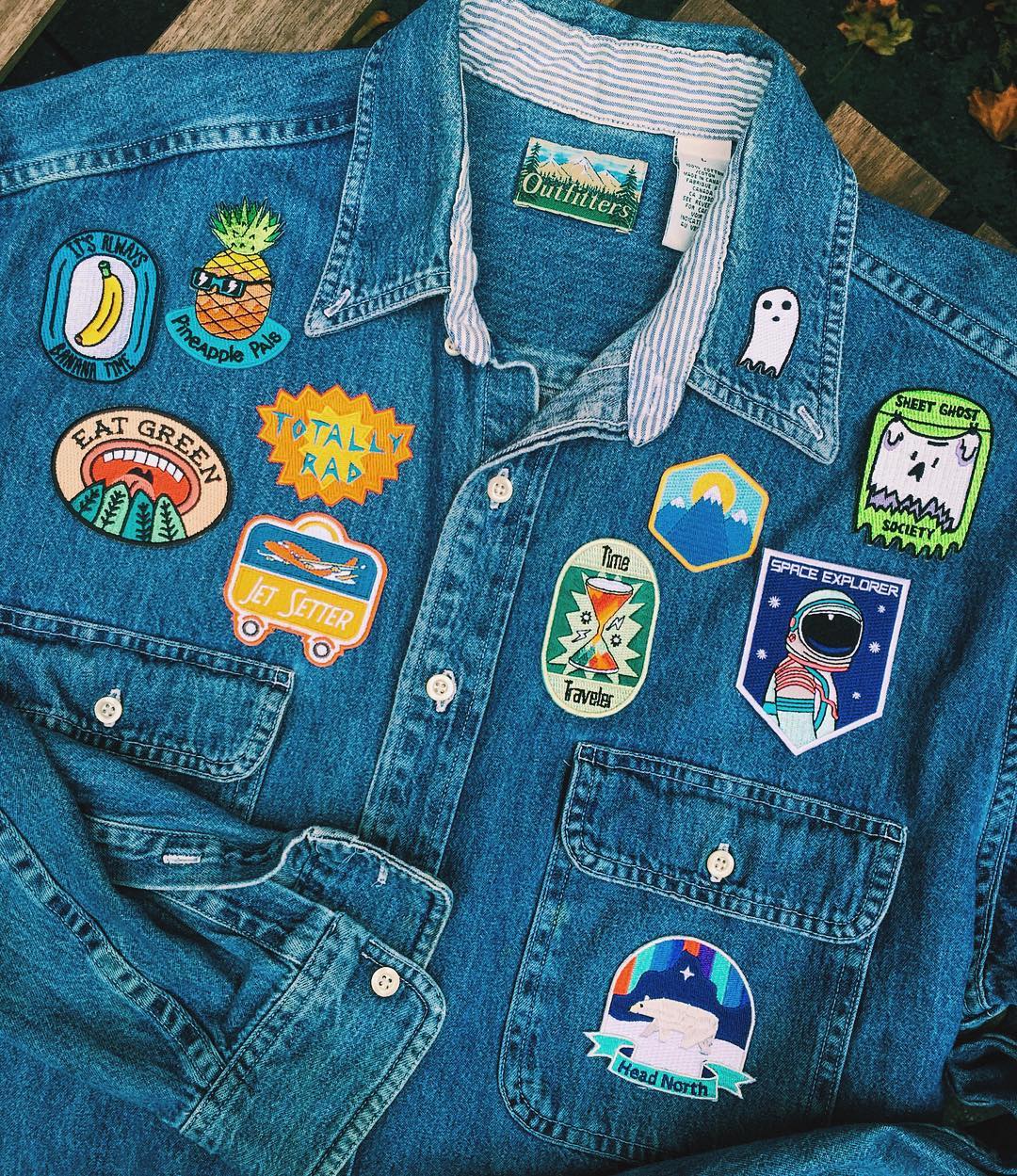 Levis jacket with different patches attached all over