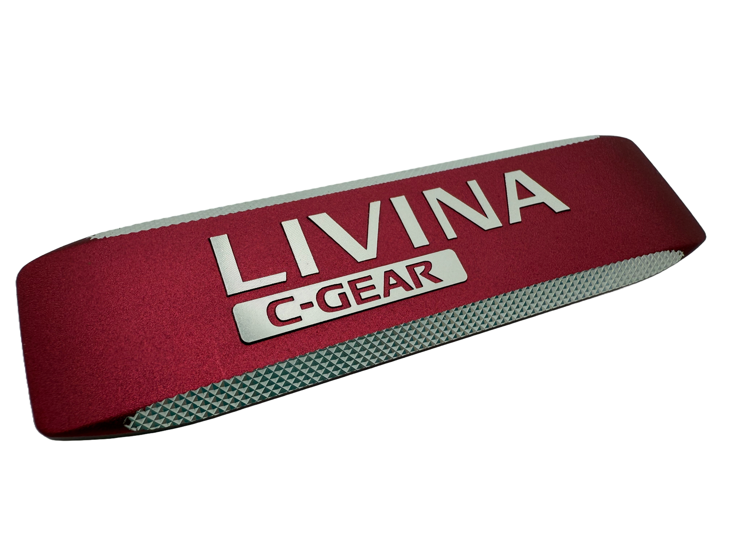 Forged aluminum badge with anodized recessed background and diamond cut lettering which reads&quot;Livina C-Gear&quot;.