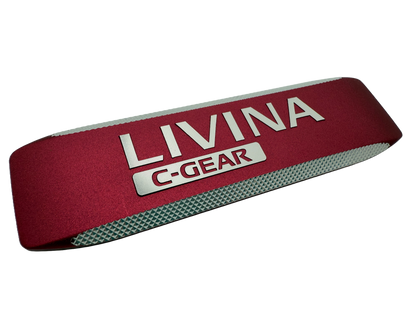 Forged aluminum badge with anodized recessed background and diamond cut lettering which reads&quot;Livina C-Gear&quot;.