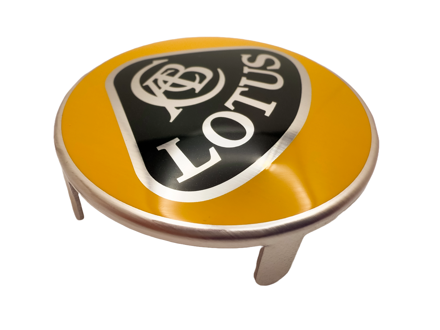 Lotus car badge with printed surface and tab attachments