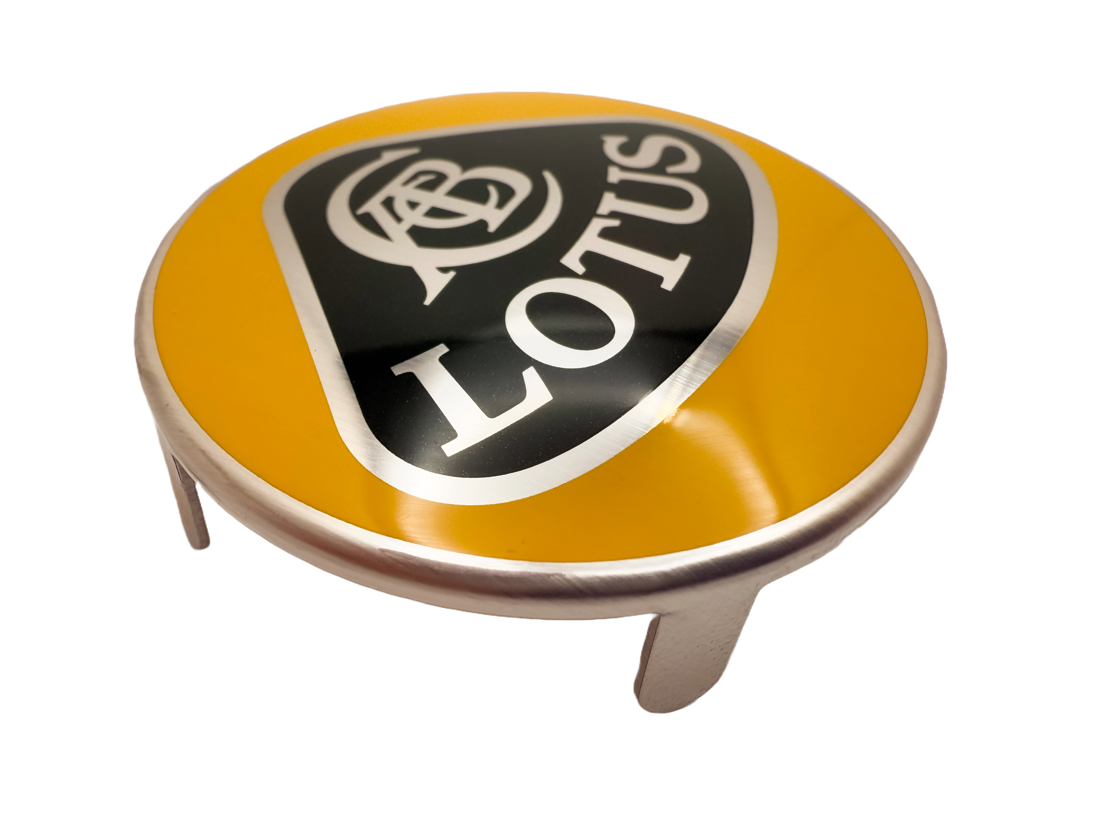 Lotus car badge with printed surface and tab attachments