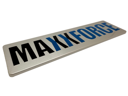 Screen printed aluminum nameplate in black and blue for the commercial truck industry with embossed text