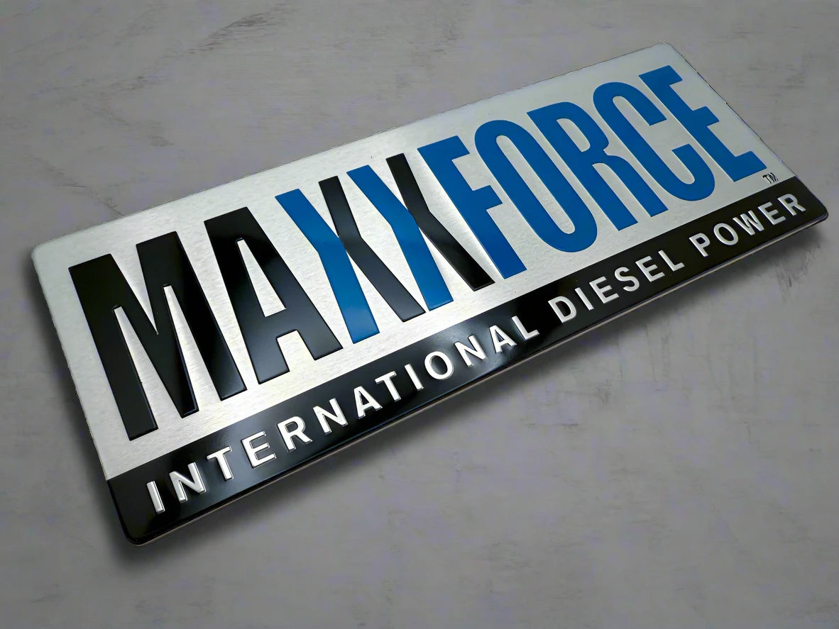 MaxxForce International Diesel Power badge logo. Badge was produced using embossing and screen printing. 