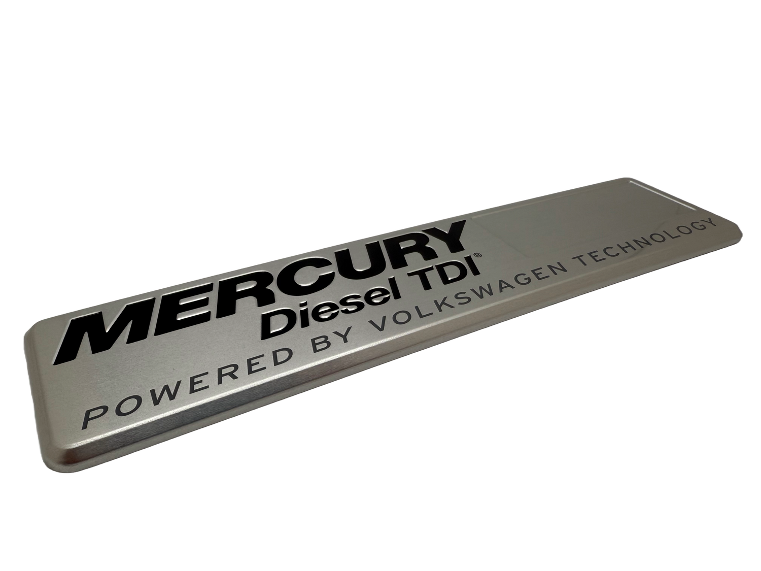 Marine badge produced using stamped aluminum with black printing and rolled edges.
