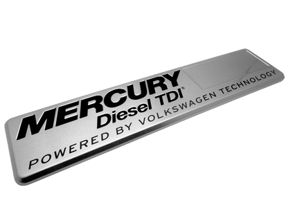 Debossed aluminum nameplate with black screen printing for durability
