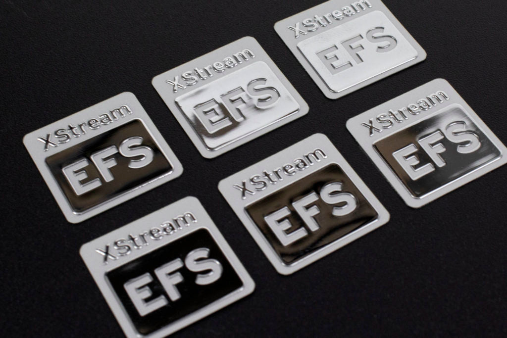 Stainless steel industrial tags made with an embossed surface