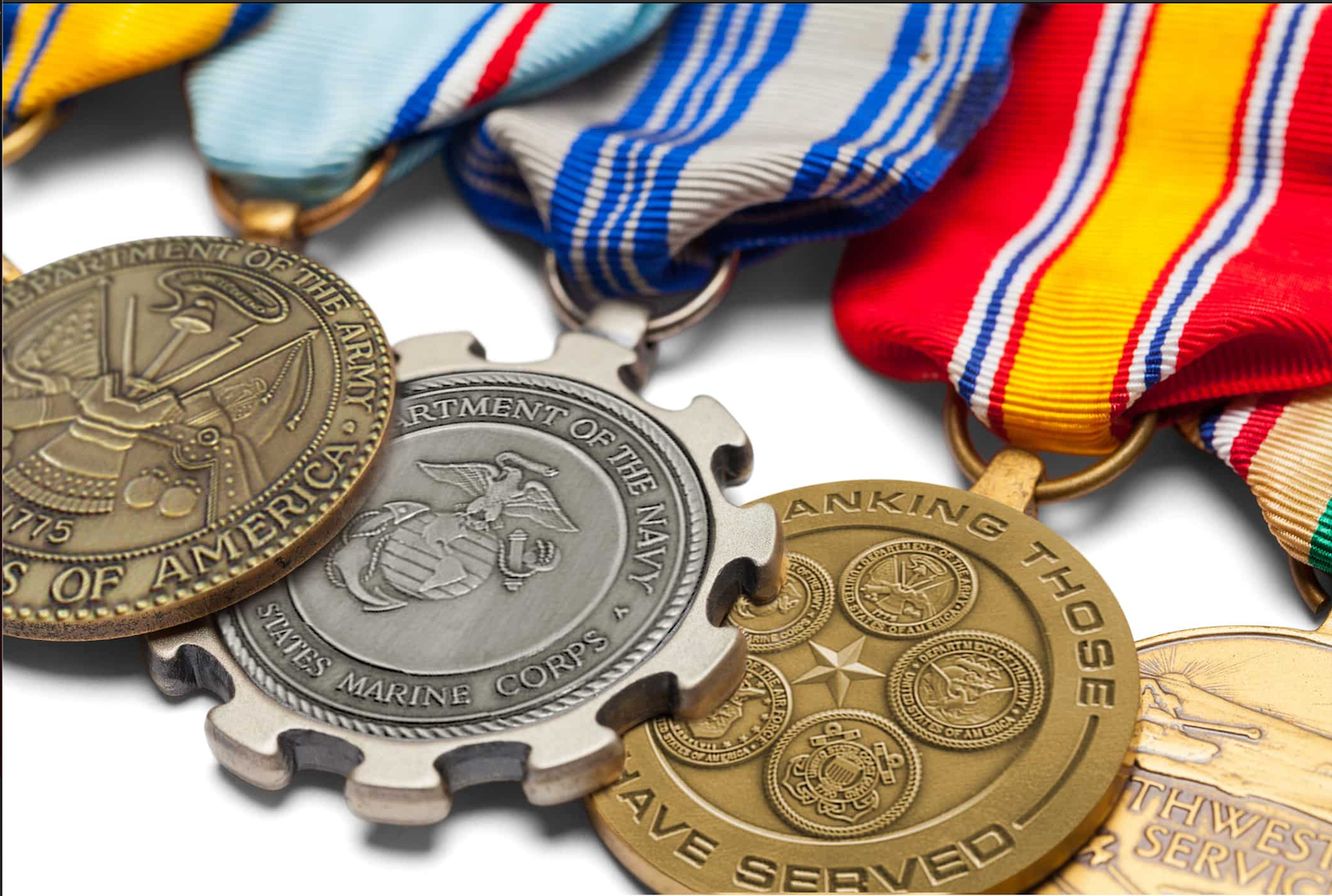 A row of custom stamped medals