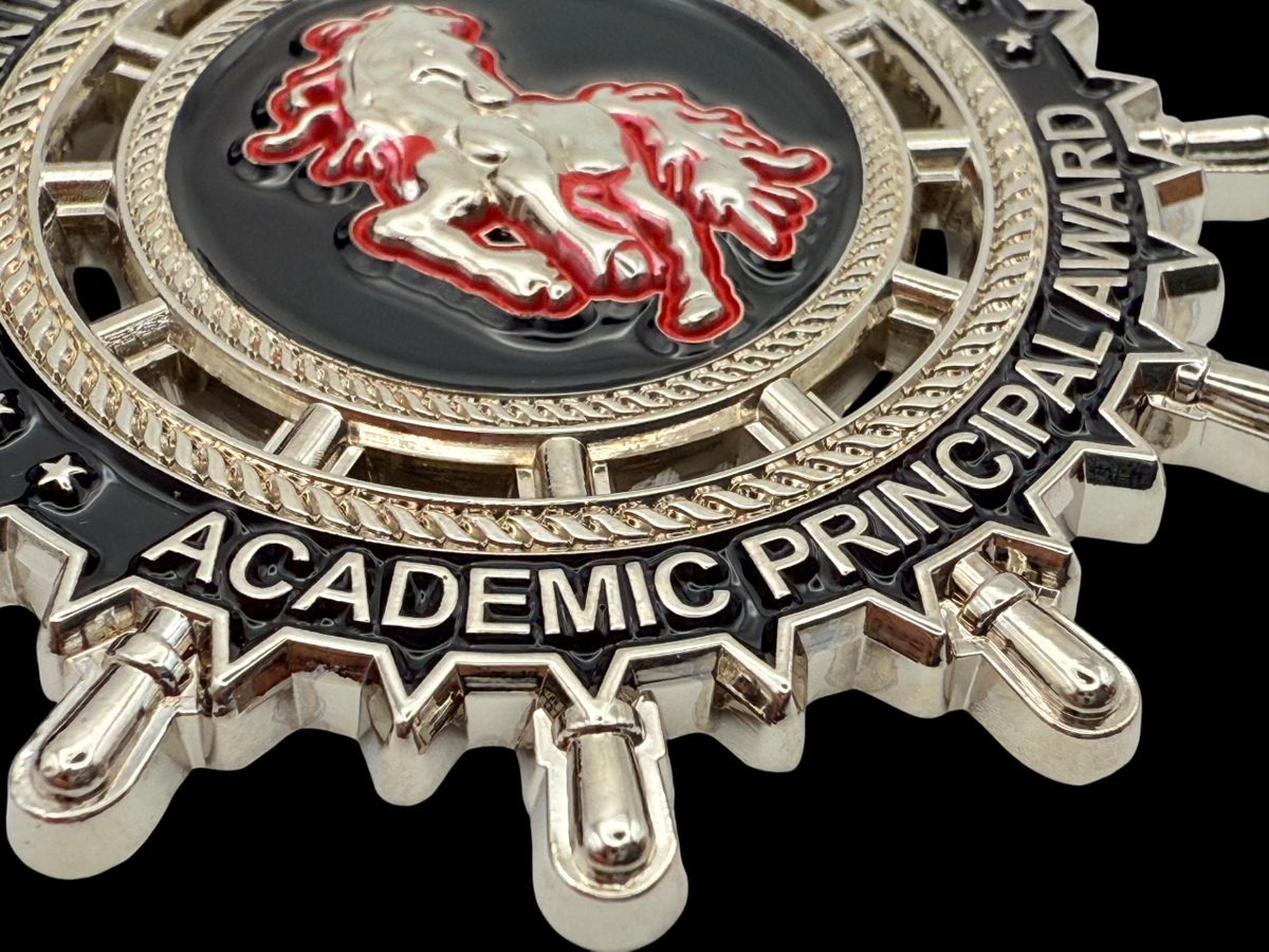 Medal produced for a public school district featuring a mustang in the middle and nickel plating with soft enamel. 