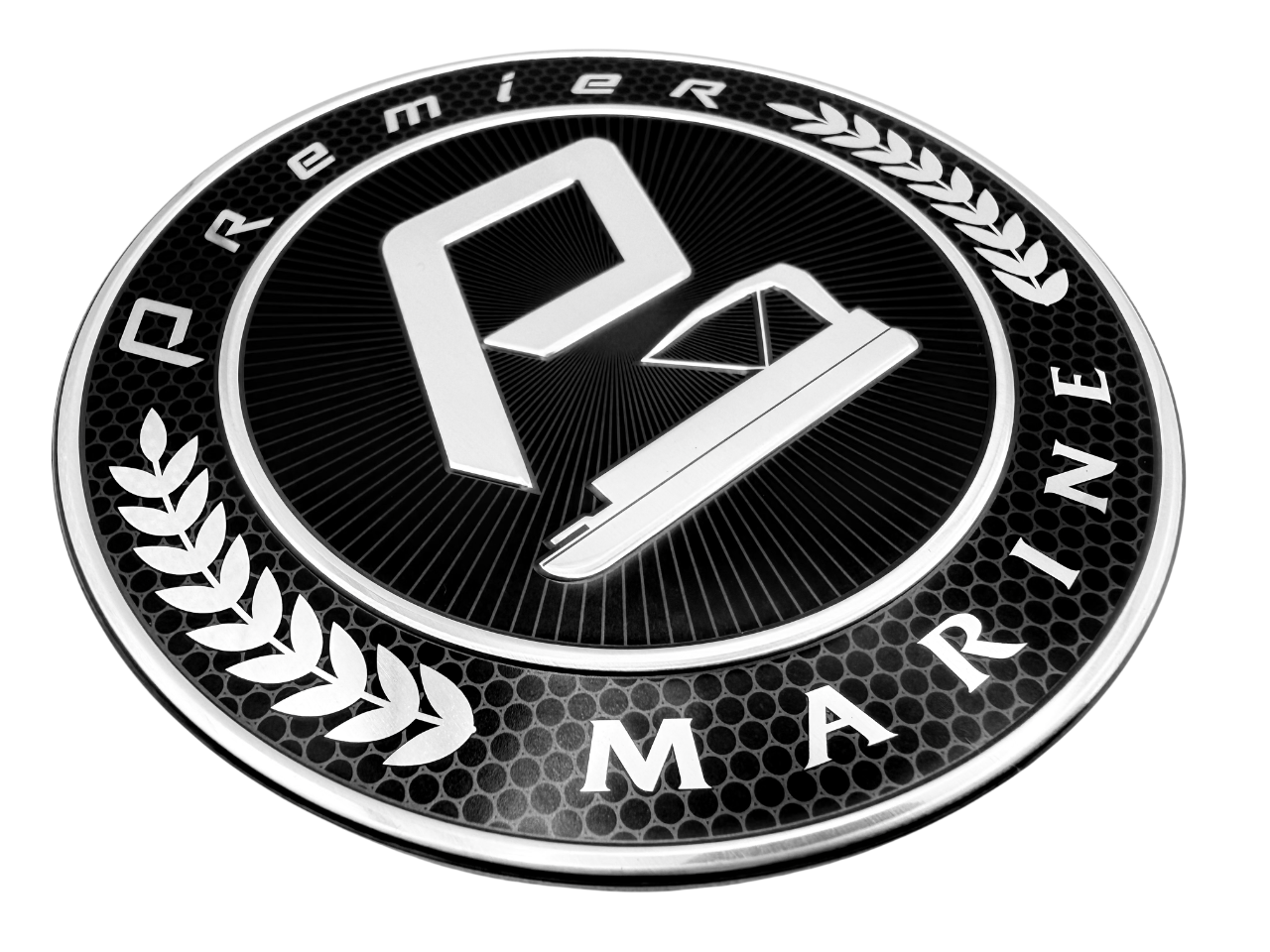 Custom embossed polished aluminum badge with screen-printed laurel wreath border and raised 'Premier Marine' logo