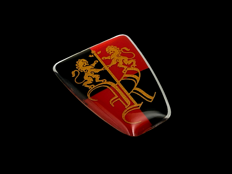 Flexible domed badge with screen printing and adhesive