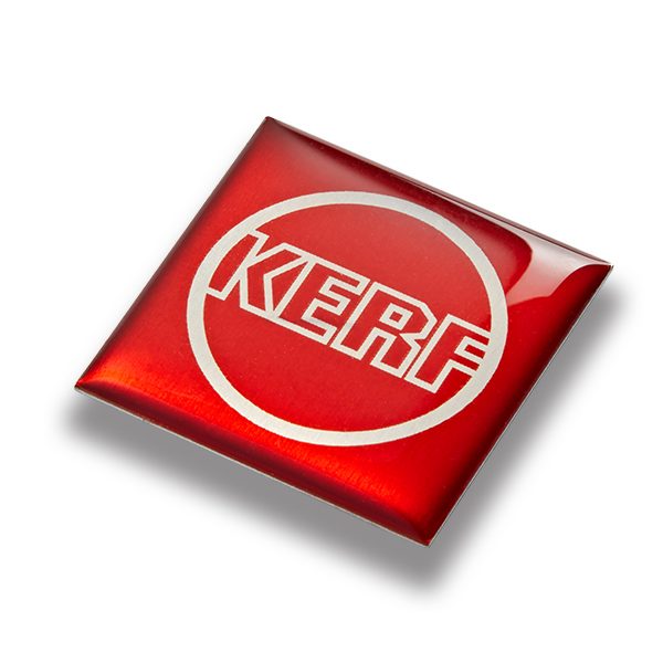 Red with white design dome label used for product branding