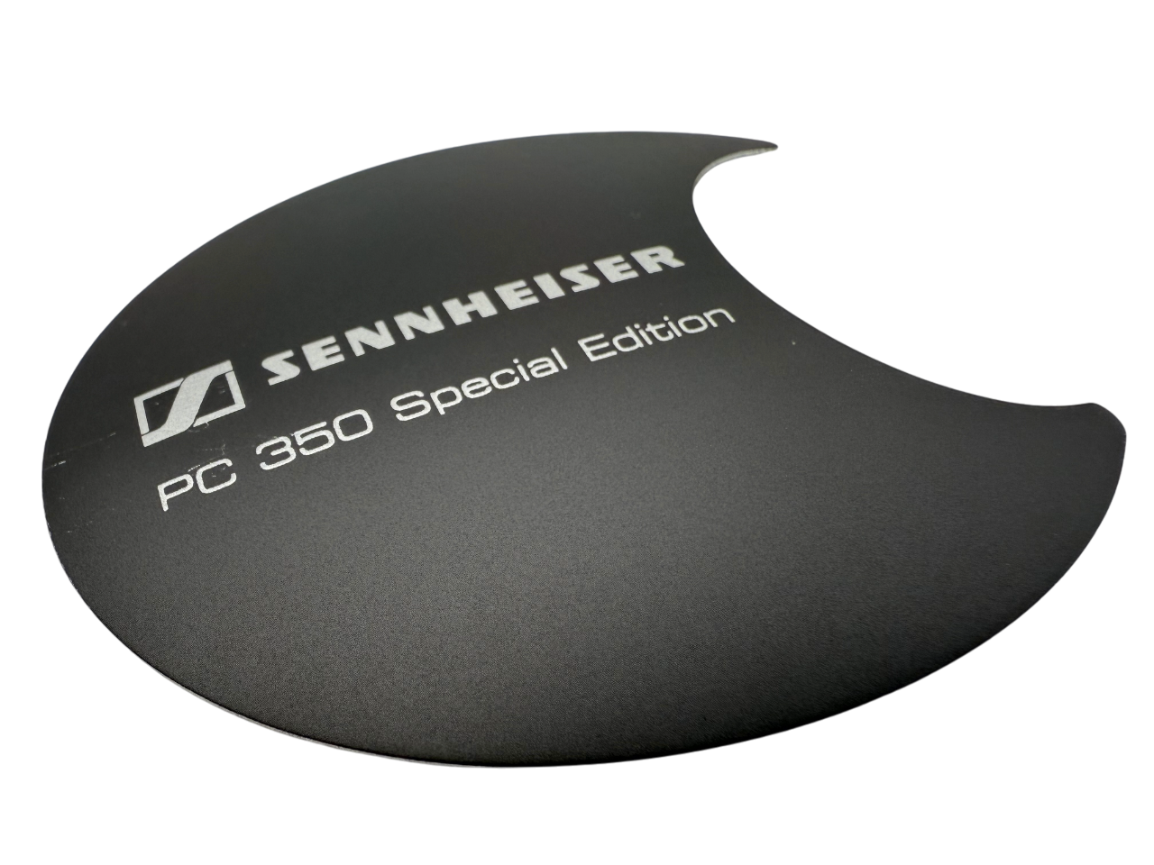 Formed aluminum electronics badge with brushing and painting.