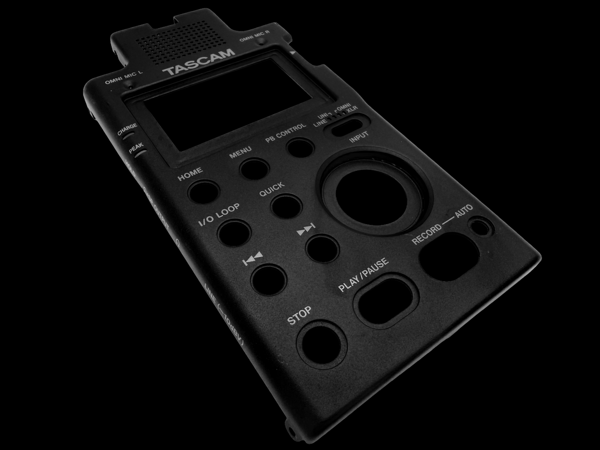 Formed aluminum front panel with surface printed legends and machined cutouts for control layout and spacing.