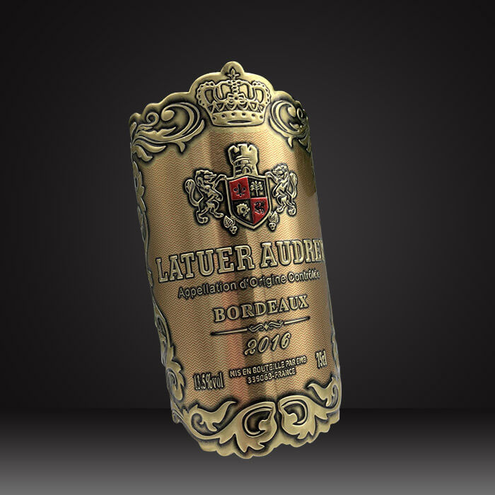 Fully embossed wine label with an antique bronze finish