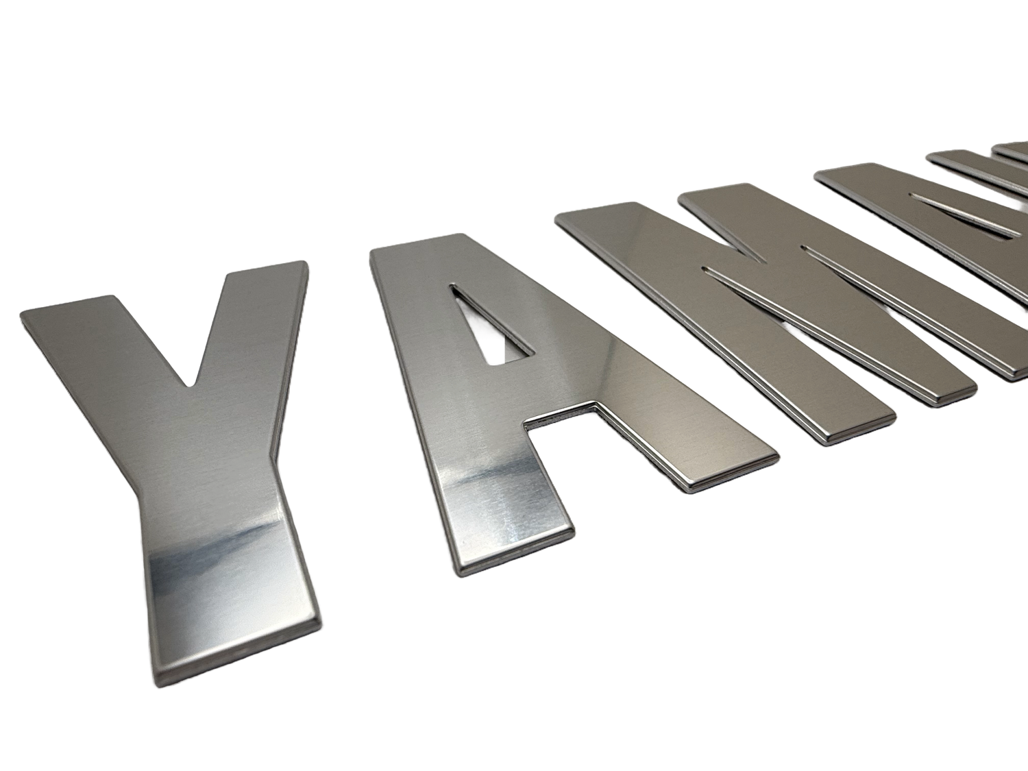 Custom boat lettering for Yamaha. Lettering was produced using mirror aluminum. 
