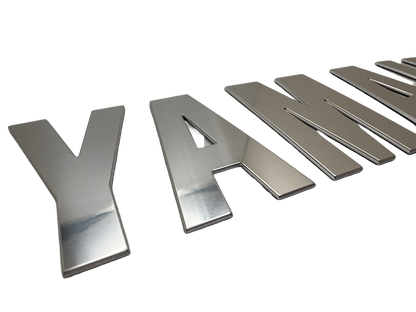 Custom boat lettering for Yamaha. Lettering was produced using mirror aluminum. 