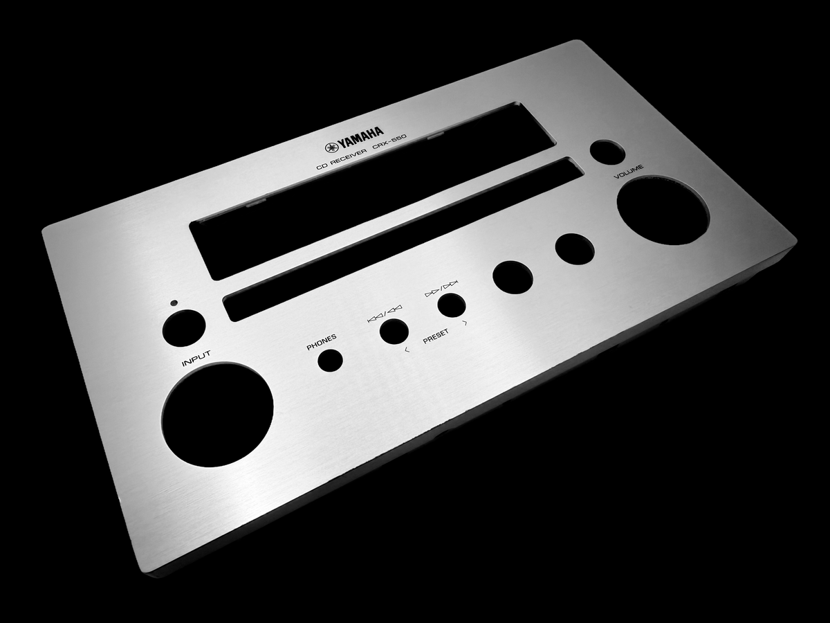 Machined aluminum faceplate with chamfered cutouts and surface marked legends for chemical and industrial environments.